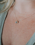 tiny hearts necklace on model